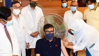 Obaidul Quader receives COVID-19 vaccine
