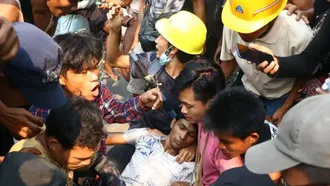 39 reported killed in Myanmar as Chinese factories burn