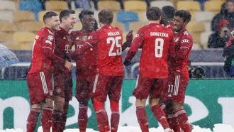 Bayern Munich seal top spot with 2-1 win at Dynamo