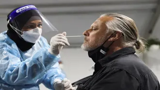 Australia records first Omicron death