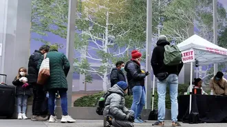 WHO warns of ‘very high’ Omicron risk as Covid surges worldwide