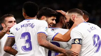 Real cruise to victory in Madrid derby