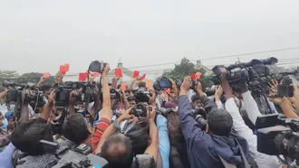 Students stage protests showing ‘red cards’