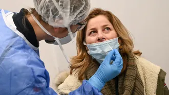 US sets new grim pandemic records with nearly 1.5m daily cases