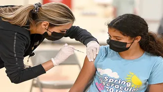 US recommends Pfizer’s COVID-19 booster for ages 12 to 15