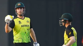 Warner, Hazlewood put Australia on verge of semis