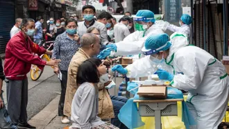 Nearly 30m under lockdown in China as coronavirus surges