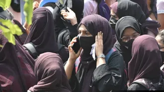 Karnataka high court upholds ban on hijab in schools and colleges