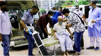 COVID-19 positivity rate drops below 15%