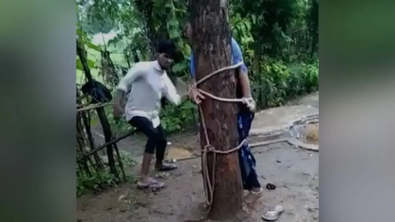 বন্ধুর সঙ্গে কথা বলায় স্ত্রীকে গাছে বেঁধে মারধর
