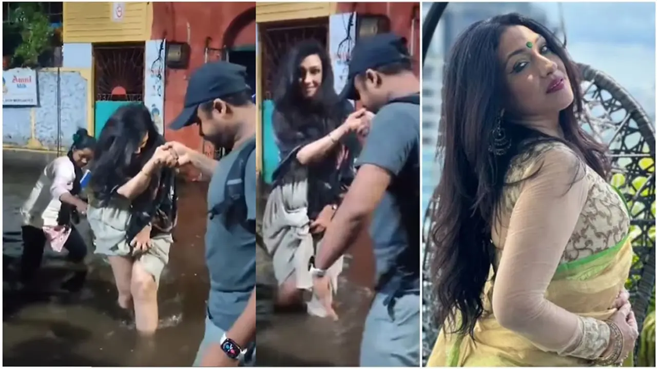 পানিতে ডুবে থাকা রাস্তায় হাঁটুর উপরে পোশাক তুলে বিপাকে ঋতুপর্ণা