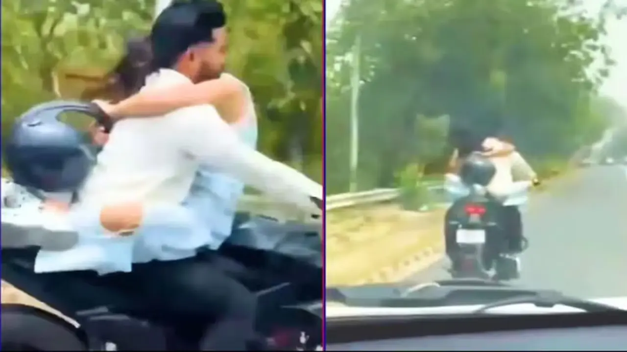 বান্ধবীকে কোলে নিয়ে বাইক চালানোয় ৭৫ হাজার টাকা জরিমানা করল পুলিশ (ভিডিও)