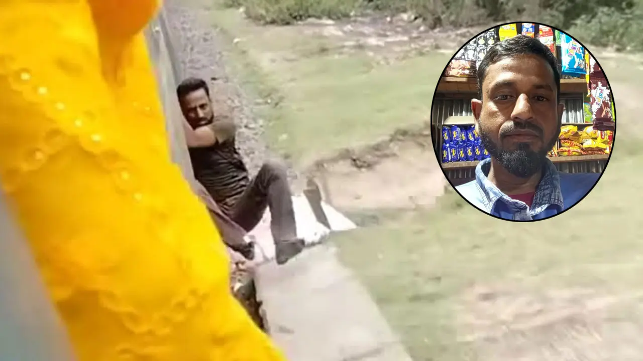 ভাইরাল ভিডিও : জোরপূর্বক ট্রেনে ঝোলানো হয় ওই ব্যক্তিকে
