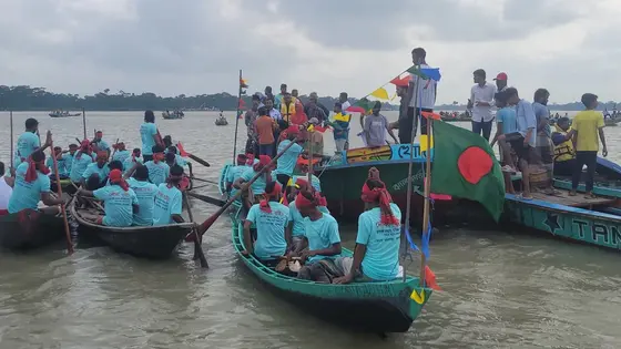 সুগন্ধা নদীতে জেলেদের নৌকাবাইচ, দর্শনার্থীদের ভিড়