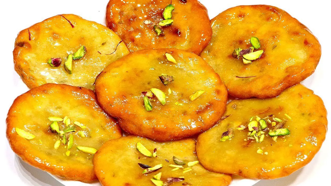 পাকা আমের পোয়া পিঠা তৈরির রেসিপি জেনে নিন